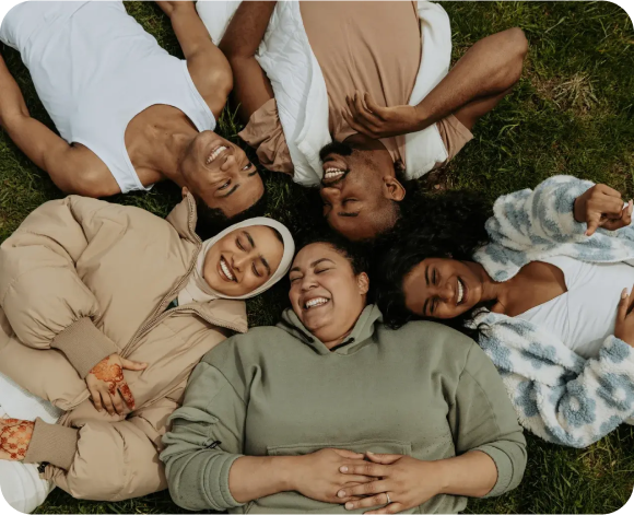 People lying on grass